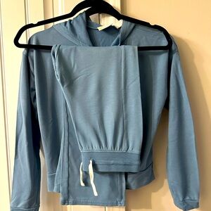Two piece, very cute, soft jogging sweat. The softest material!